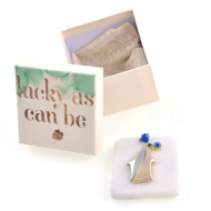 Picture of METALIC CHARM ON MARBLE